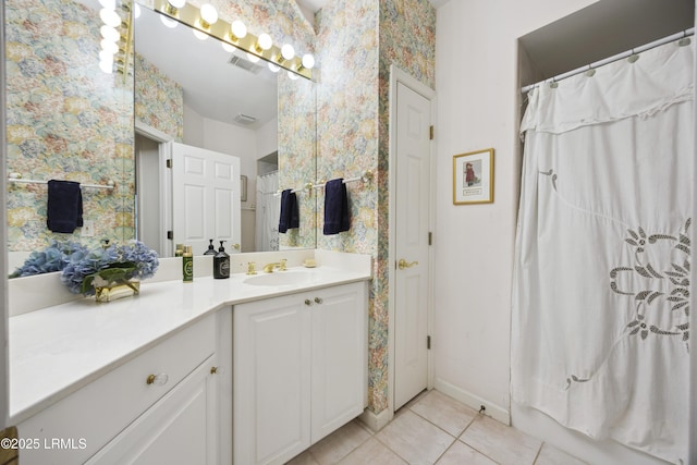 2 Lenox Ln, Hilton Head Island, SC 29926 - bathroom with tile patterned flooring, vanity, wallpapered walls, curtained shower, and baseboards