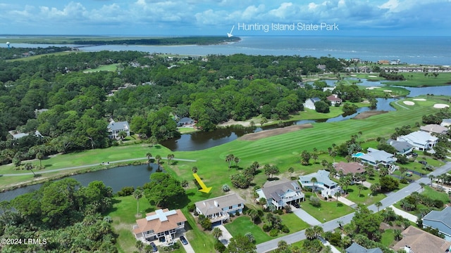 bird's eye view with a water view