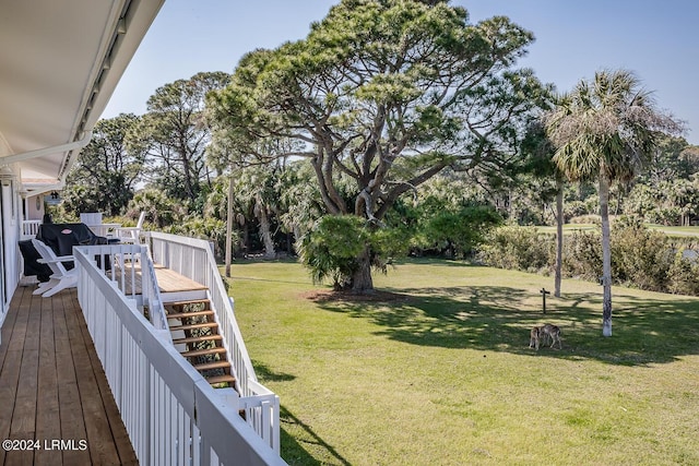 view of yard with a wooden deck