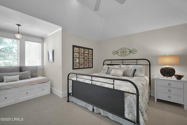 bedroom featuring light carpet and ceiling fan