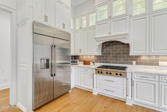 4 Wedgewood Cir, Bluffton, SC 29910 - kitchen with stainless steel appliances, white cabinetry, and light wood finished floors