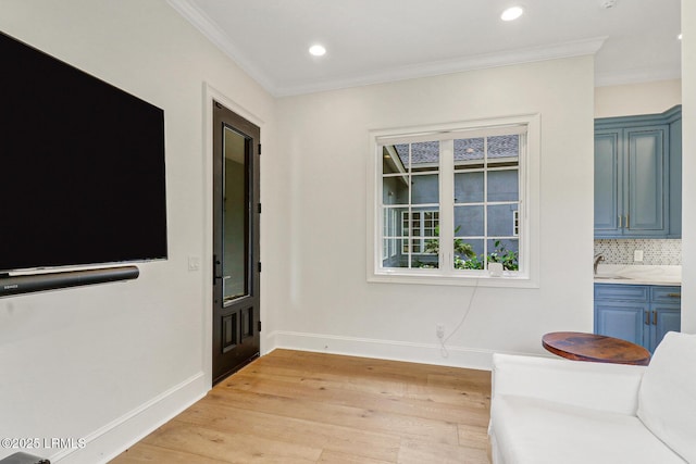 4 Wedgewood Cir, Bluffton, SC 29910 - unfurnished room featuring baseboards, light wood-style floors, ornamental molding, a sink, and recessed lighting