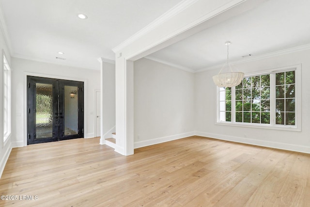 4 Wedgewood Cir, Bluffton, SC 29910 - unfurnished room with a chandelier, ornamental molding, baseboards, light wood finished floors, and french doors