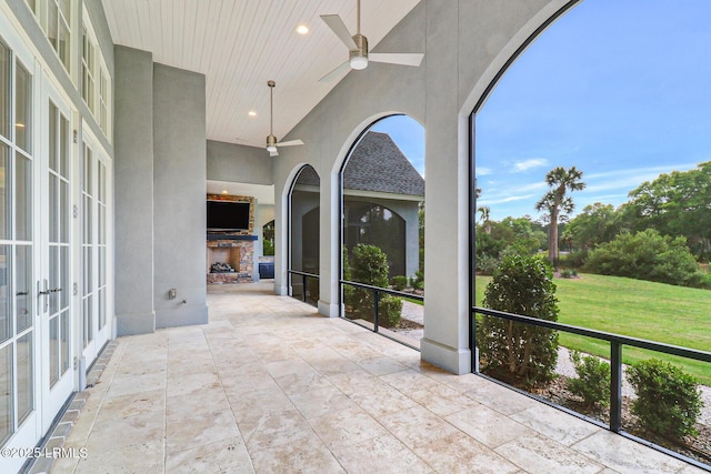 4 Wedgewood Cir, Bluffton, SC 29910 - view of patio with exterior fireplace, a ceiling fan, and french doors