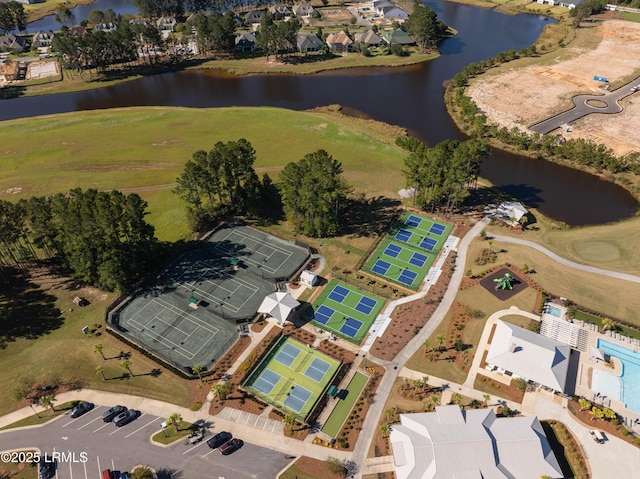 birds eye view of property featuring a water view