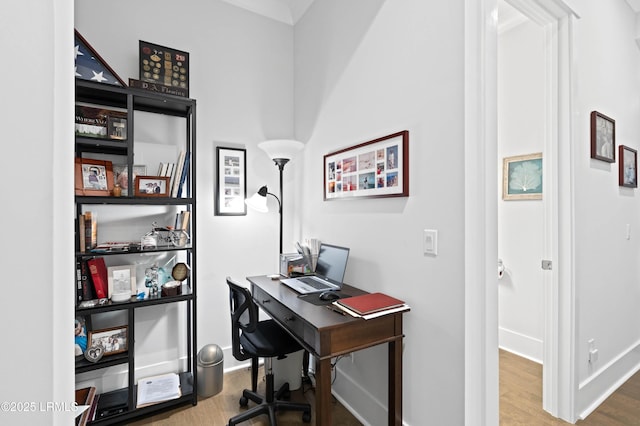 office area with wood-type flooring