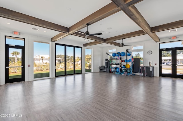 interior space featuring coffered ceiling, hardwood / wood-style flooring, french doors, and ceiling fan