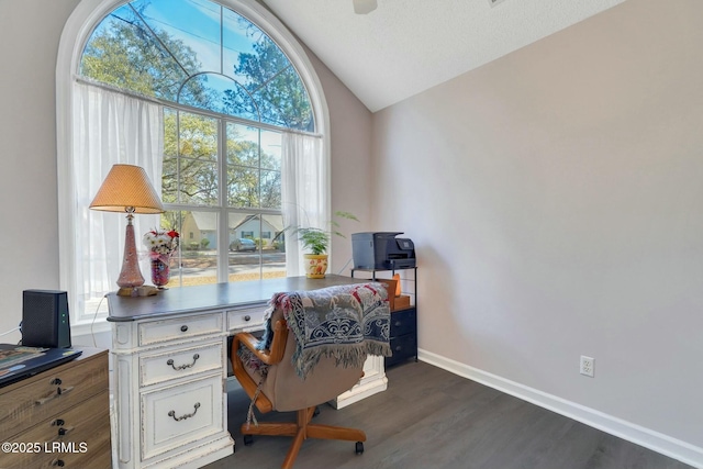 office area featuring dark hardwood / wood-style flooring and vaulted ceiling