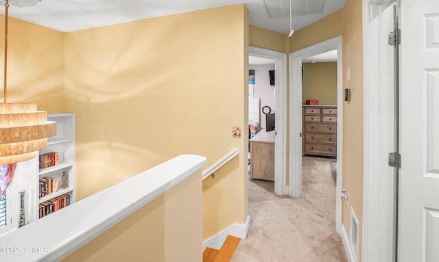 8 Battery Point Ln, Beaufort, SC 29902 - corridor with light colored carpet and attic access