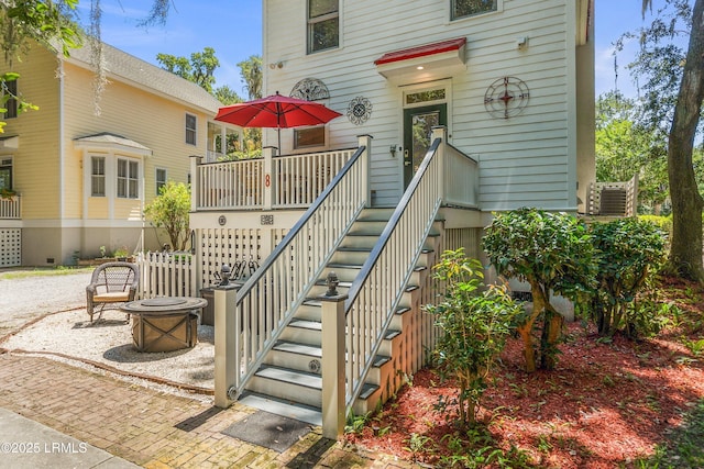 8 Battery Point Ln, Beaufort, SC 29902 - back of property with stairway and an outdoor fire pit