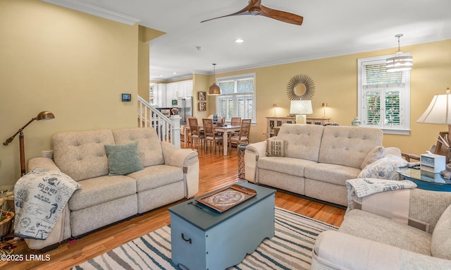 8 Battery Point Ln, Beaufort, SC 29902 - living room with light wood-style floors, crown molding, ceiling fan, and recessed lighting
