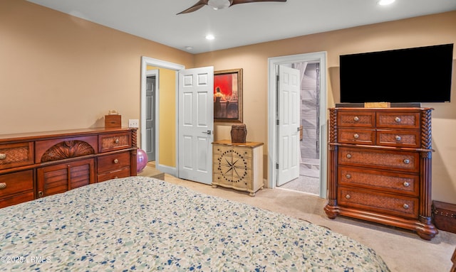 8 Battery Point Ln, Beaufort, SC 29902 - bedroom with light colored carpet, recessed lighting, ceiling fan, and ensuite bath