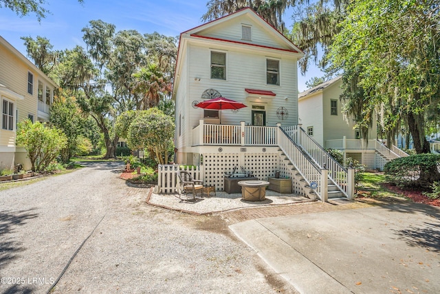 8 Battery Point Ln, Beaufort, SC 29902 - view of front of house with stairs and a patio