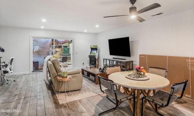 living room featuring ceiling fan