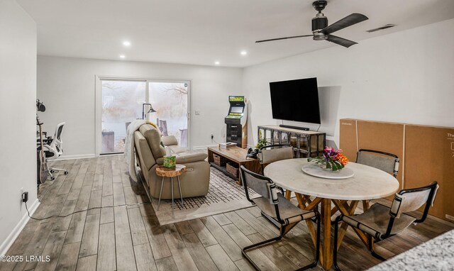 living room featuring ceiling fan