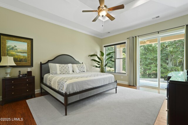 19 Lynnfield Pl, Bluffton, SC 29910 - bedroom featuring access to exterior, wood finished floors, crown molding, and ceiling fan