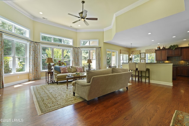 19 Lynnfield Pl, Bluffton, SC 29910 - living room featuring healthy amount of natural light, ornamental molding, dark wood-style flooring, ceiling fan, and recessed lighting