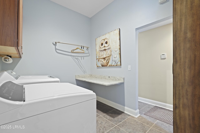 19 Lynnfield Pl, Bluffton, SC 29910 - washroom featuring cabinet space, washing machine and dryer, and tile patterned flooring