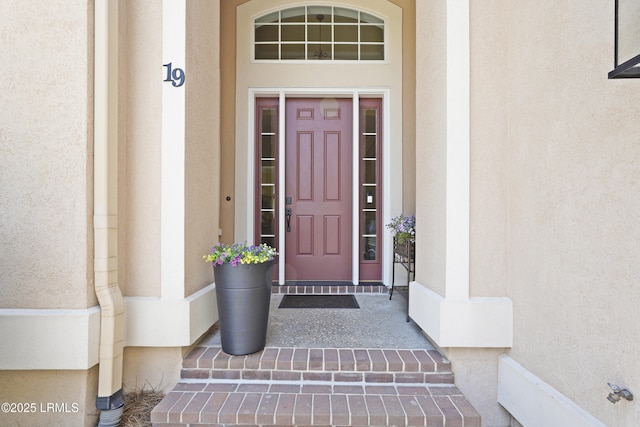 19 Lynnfield Pl, Bluffton, SC 29910 - doorway to property featuring stucco siding
