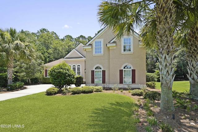 19 Lynnfield Pl, Bluffton, SC 29910 - view of front of home featuring stucco siding and a front yard