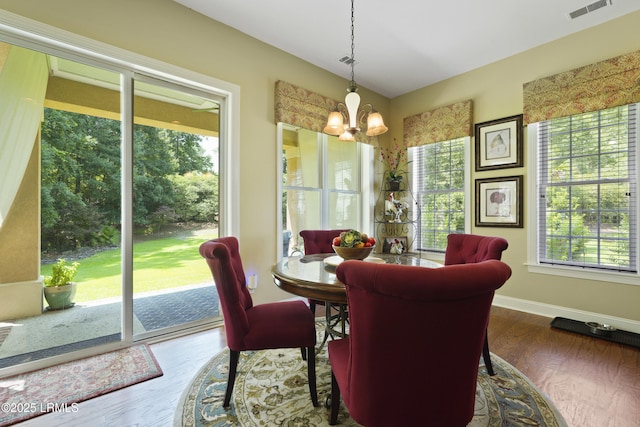 19 Lynnfield Pl, Bluffton, SC 29910 - dining space with a chandelier and wood finished floors
