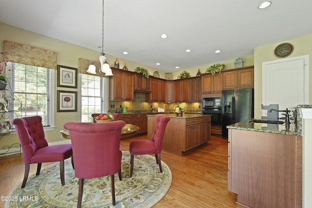 19 Lynnfield Pl, Bluffton, SC 29910 - dining area featuring light wood-style flooring, a chandelier, and recessed lighting