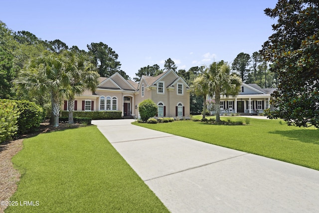 19 Lynnfield Pl, Bluffton, SC 29910 - view of front facade featuring driveway and a front yard