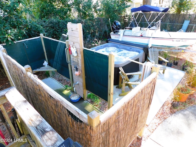 entry to storm shelter with central AC and a hot tub