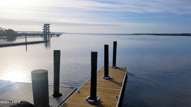 view of dock with a water view