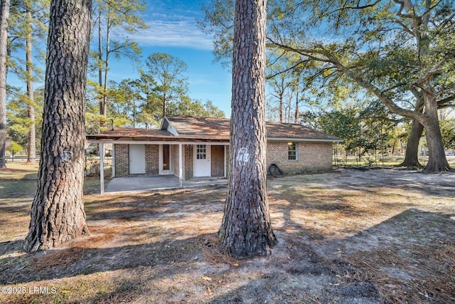 view of front of home featuring a patio