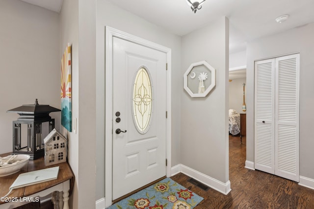 838 Fiddlers Ridge Rd, Fripp Island, SC 29920 - foyer entrance with dark wood-style flooring and baseboards