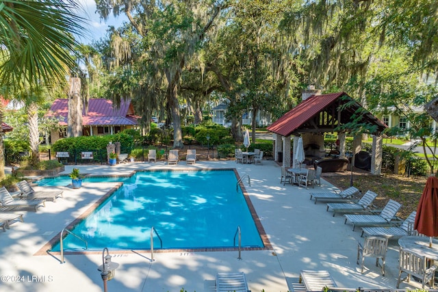 view of pool with a gazebo and a patio area