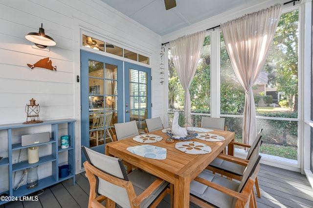 sunroom / solarium featuring ceiling fan and french doors