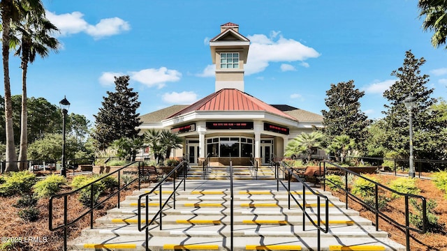 view of building exterior featuring fence