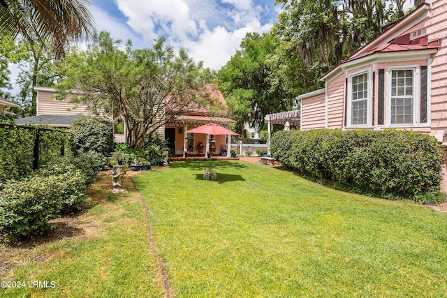 view of yard with a patio area and fence