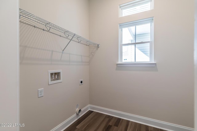 laundry area featuring hookup for a washing machine, dark wood-type flooring, and hookup for an electric dryer