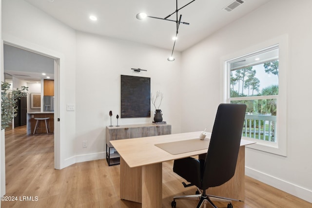 office area with light wood-type flooring