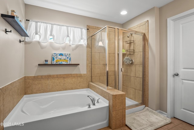 42 Kiawah Dr, Beaufort, SC 29906 - bathroom with a shower stall, a bath, recessed lighting, and tile patterned floors