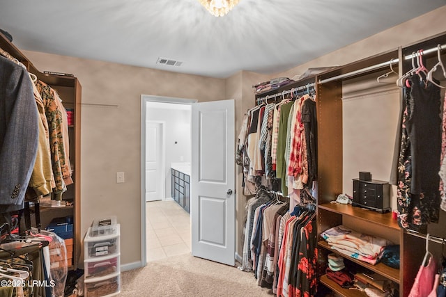 42 Kiawah Dr, Beaufort, SC 29906 - spacious closet featuring light colored carpet and light tile patterned floors