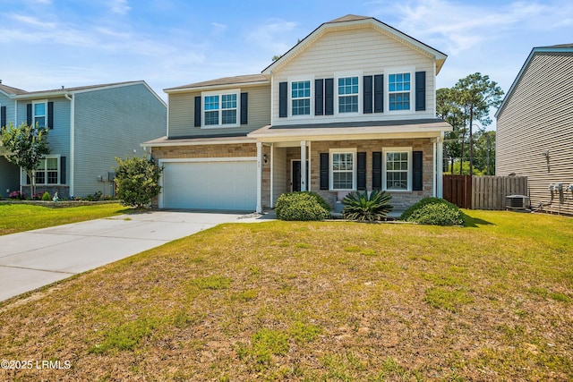42 Kiawah Dr, Beaufort, SC 29906 - traditional-style house with an attached garage, concrete driveway, a porch, stone siding, and central AC