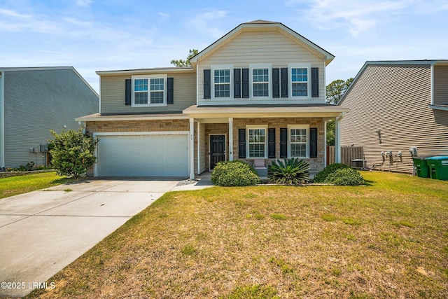 42 Kiawah Dr, Beaufort, SC 29906 - traditional-style house featuring an attached garage, a front lawn, concrete driveway, and a porch