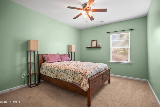 42 Kiawah Dr, Beaufort, SC 29906 - bedroom with light colored carpet, baseboards, and ceiling fan