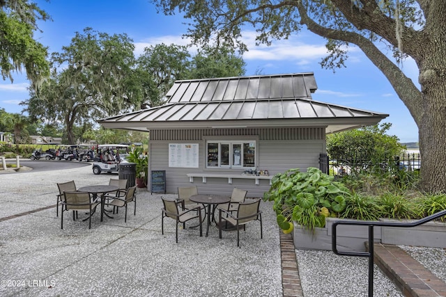 view of patio / terrace featuring fence