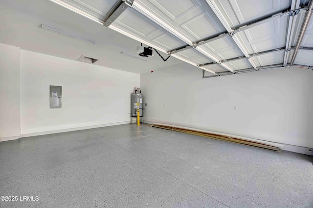 garage featuring a garage door opener, electric panel, electric water heater, and baseboards