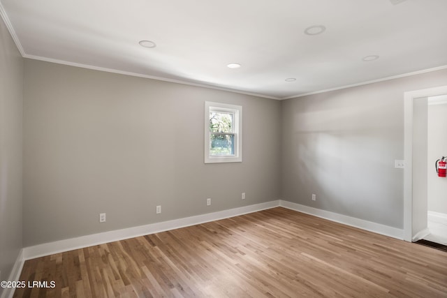 67 Sams Point Rd, Beaufort, SC 29907 - spare room with baseboards, crown molding, wood finished floors, and recessed lighting