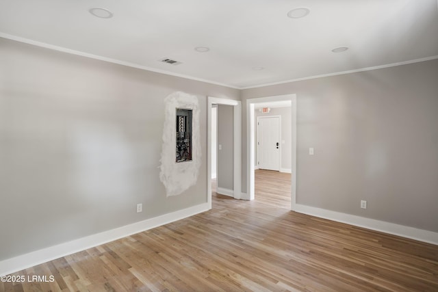 67 Sams Point Rd, Beaufort, SC 29907 - unfurnished room featuring light wood-style floors, crown molding, and baseboards