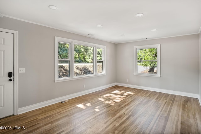 67 Sams Point Rd, Beaufort, SC 29907 - unfurnished room featuring recessed lighting, wood finished floors, visible vents, ornamental molding, and baseboards