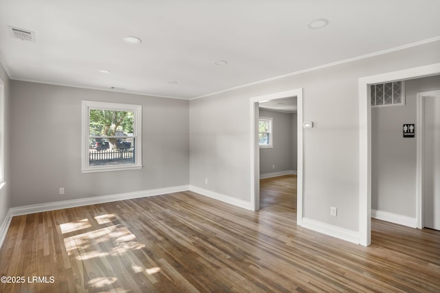 67 Sams Point Rd, Beaufort, SC 29907 - spare room featuring wood finished floors, visible vents, and plenty of natural light