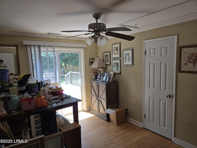 522 Meritta Ave, Beaufort, SC 29902 - office with a ceiling fan, light wood finished floors, and crown molding