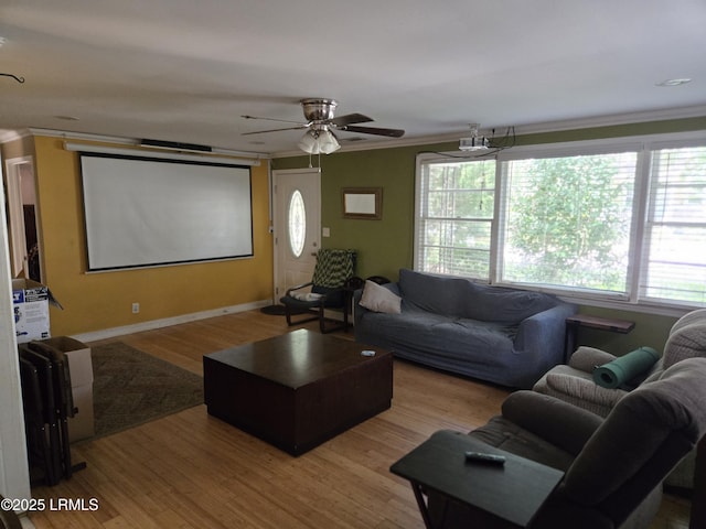 522 Meritta Ave, Beaufort, SC 29902 - living area featuring crown molding, wood finished floors, and a ceiling fan